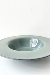 A slight overhead view of the Degustation Bowl in size small against a white backdrop