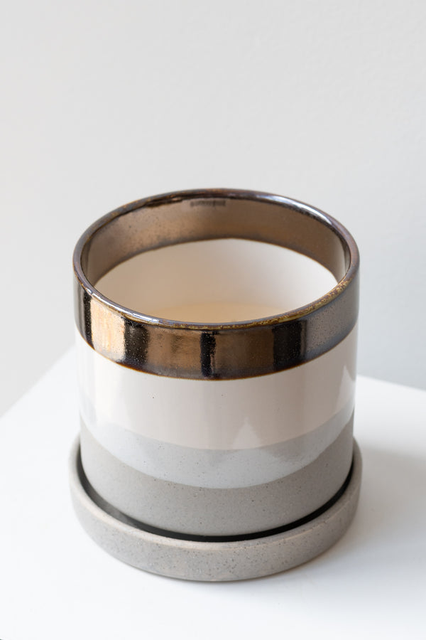 Large Mocha Cement Minute Pot sits on a white surface in a white room