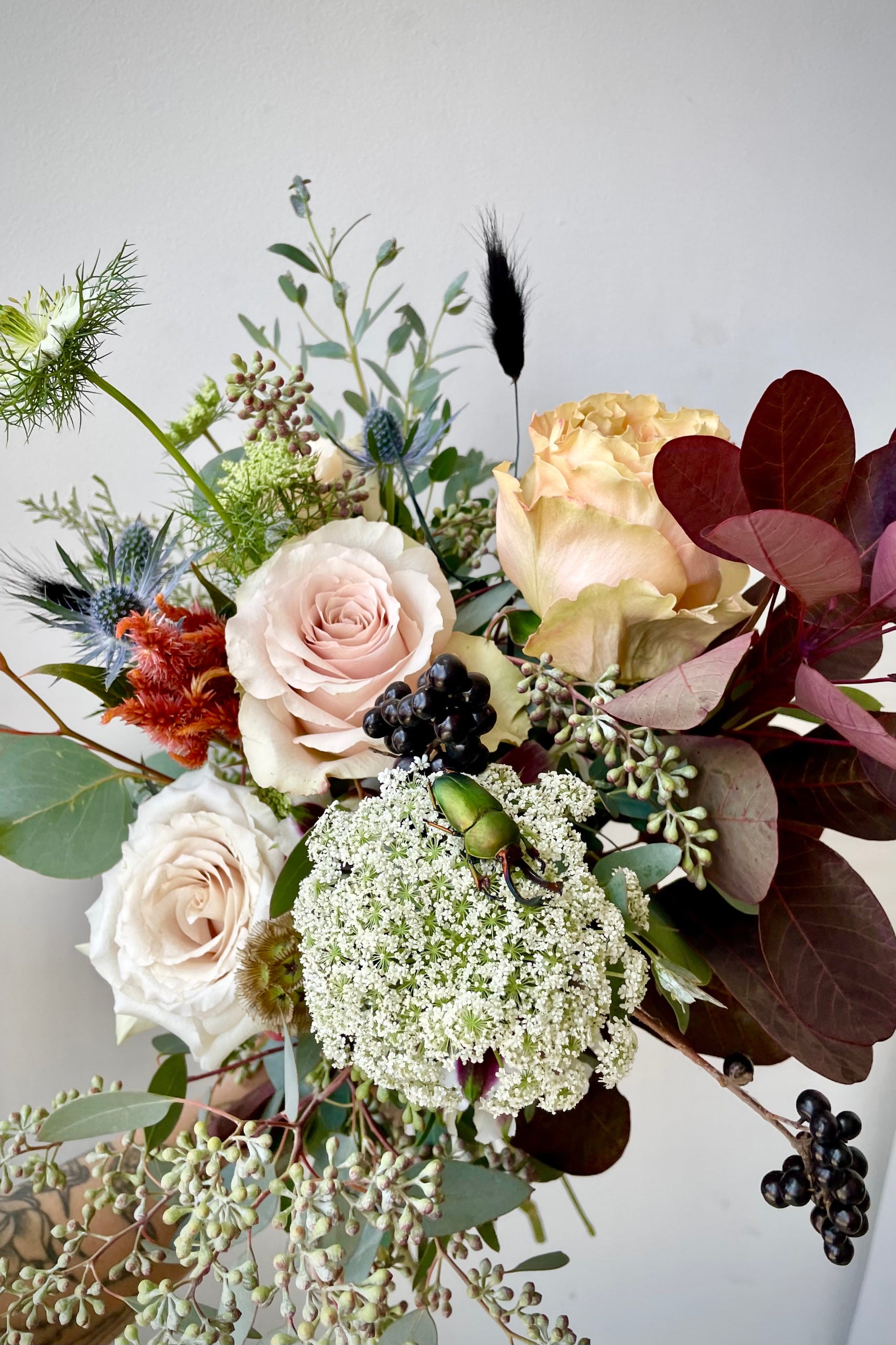 Betelgeuse arrangement by Sprout Home with a Beetle on top of Queen Annes Lace. ©Sprout Home #size_$130