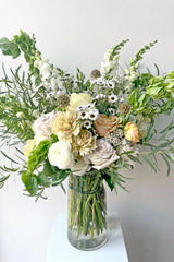 An example of Fresh Floral Arrangement Bleached in the $200 range from Sprout Home Floral in Chicago