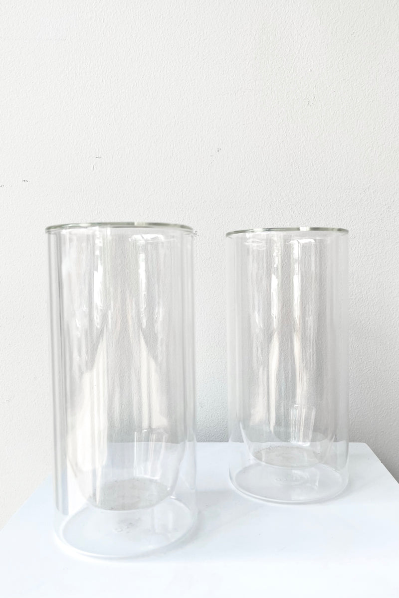 A frontal view of the set of 2 Clear Double Wall Glass in 16 oz against a white backdrop