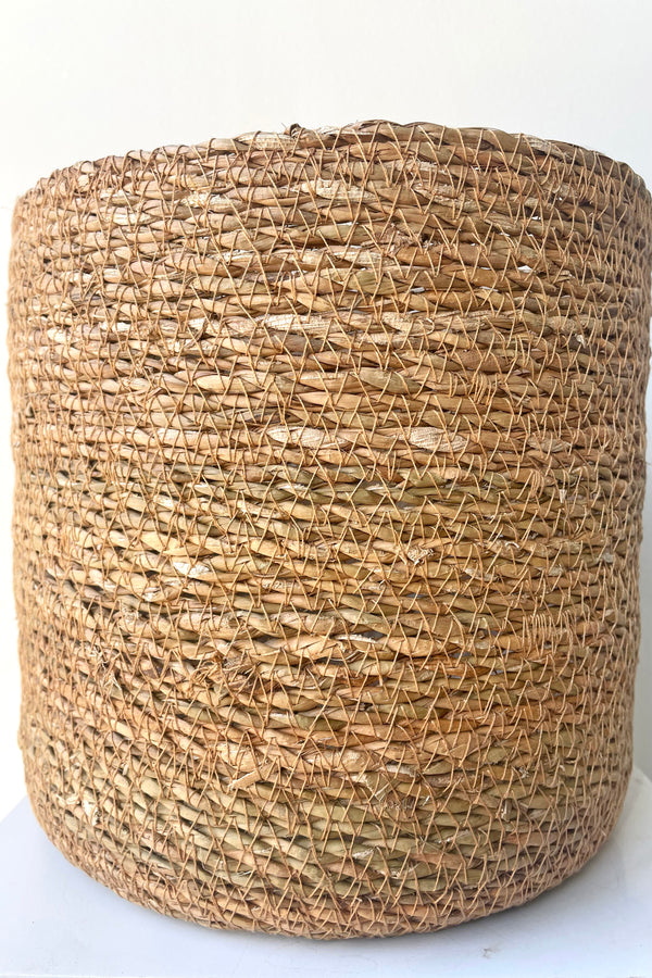 A close view of Seagrass Basket with liner 8.5" against white backdrop