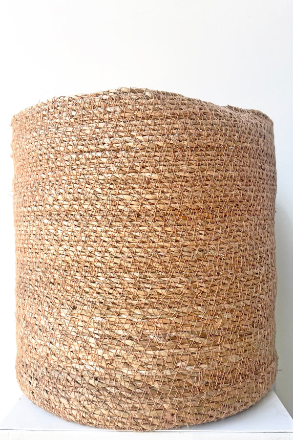 A close view of Seagrass Basket with liner 11" against white backdrop
