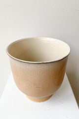 An overhead view of the Champagne Stoneware 6 1/2" Pot.
