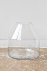 Large glass silo terrarium vessel against white background