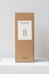 Ferm living Ripple Carafe glass clear box on a white surface in a white room