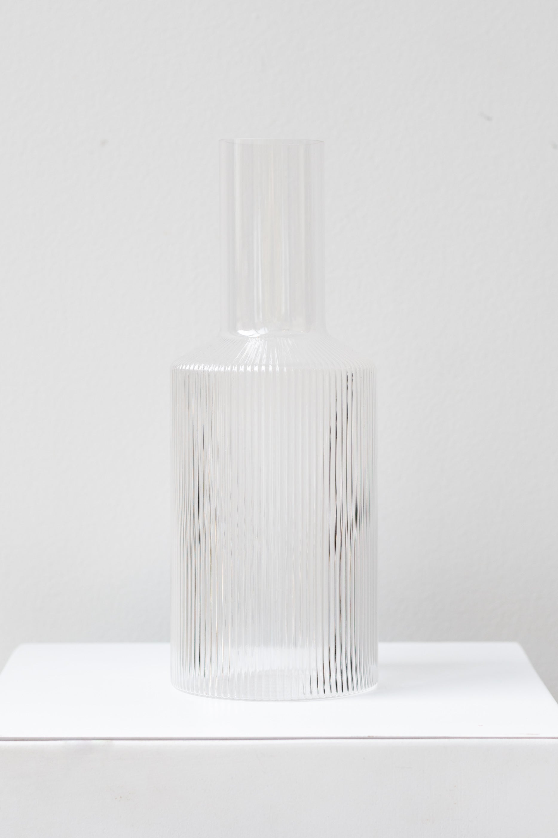 Ferm Living Ripple Carafe glass clear on white surface in a white room