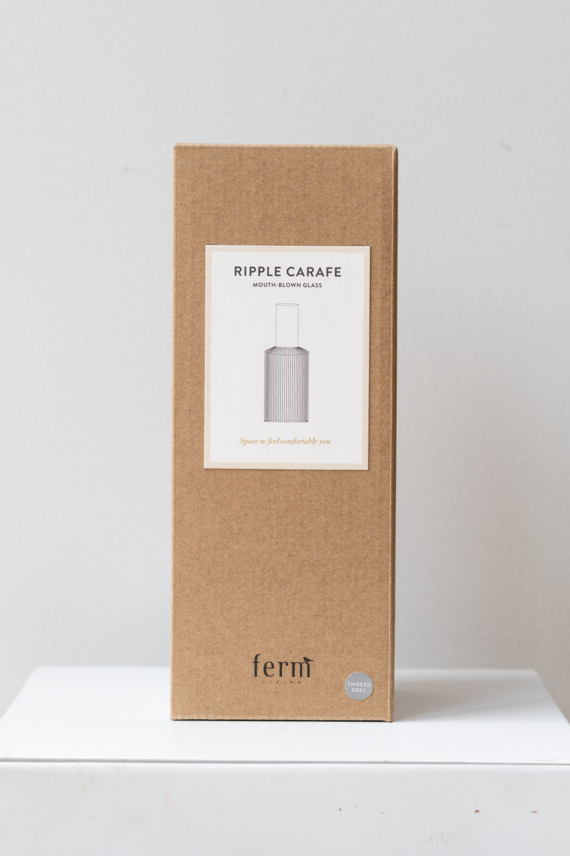 Ferm living Ripple Carafe glass smoke box on a white surface in a white room
