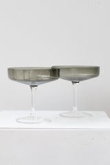 Ferm Living Ripple Champagne Saucers Set of 2 glass smoke on a white surface in a white room