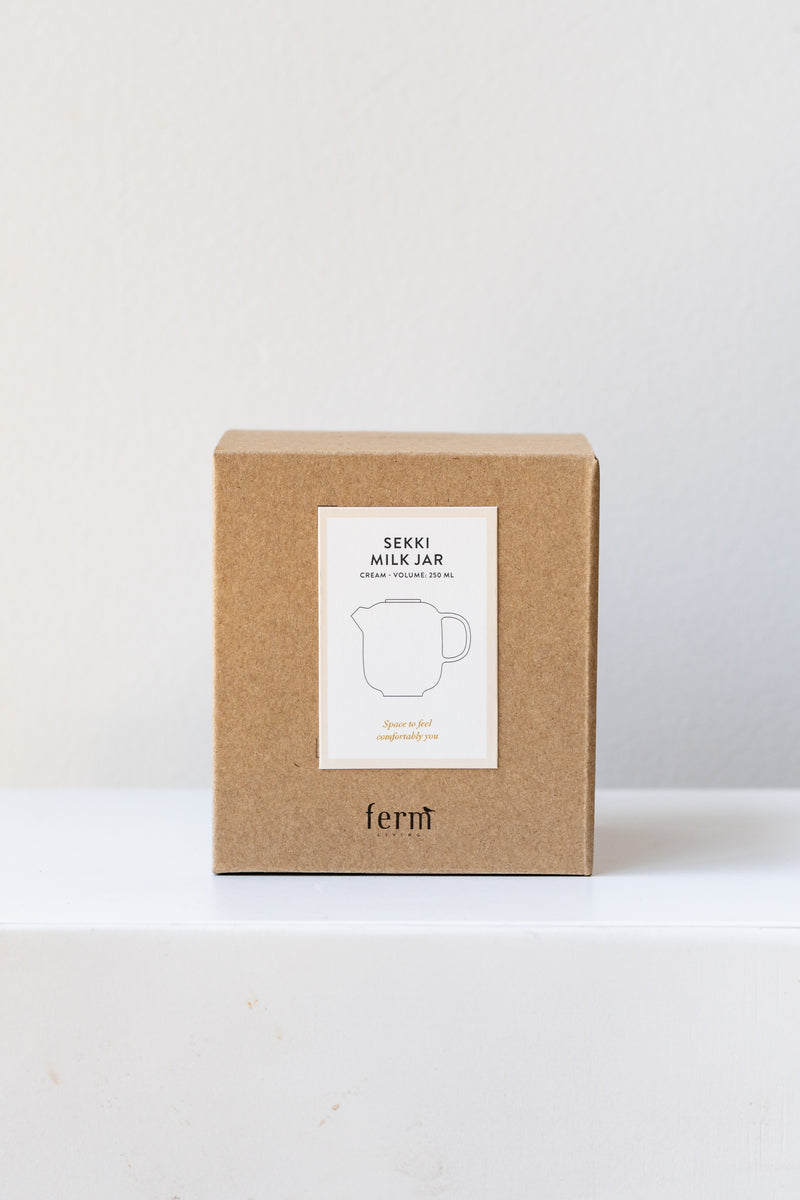 Box for Sekki milk jar by Ferm Living in front of white background