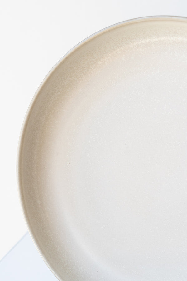 Close up of Ferm Living Sekki Plate cream small in front of white background