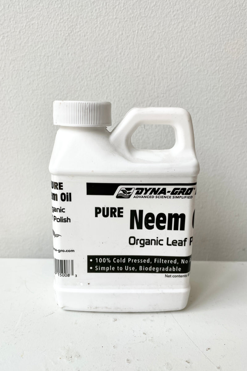 Neem Concentrate dyna-gro 8oz. against a white wall