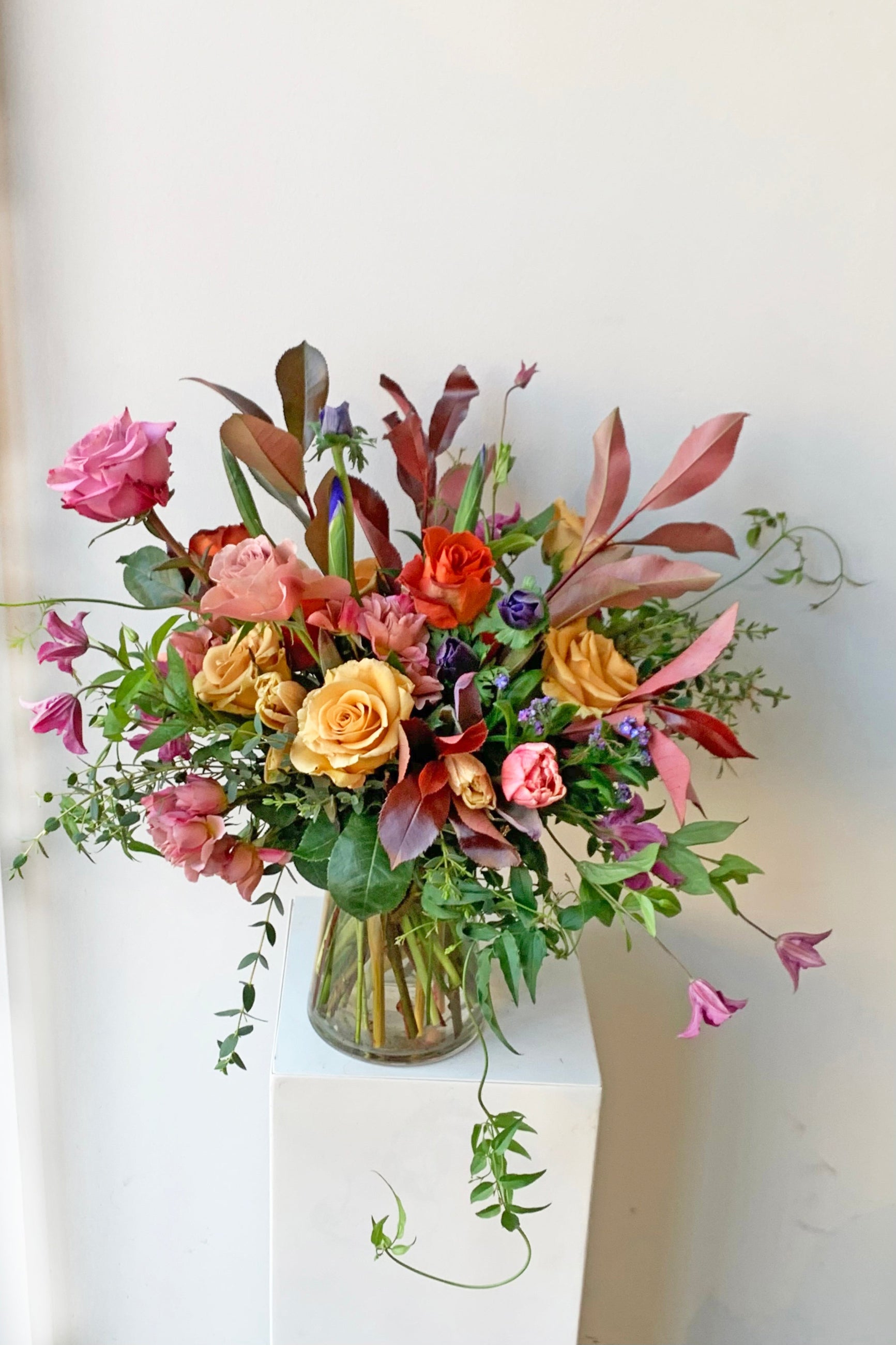 An example of fresh Floral Arrangement Dusk with clematis and golden roses from Sprout Home Floral in Chicago ©Sprout Home #size_$160