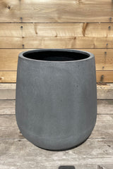The medium fiberstone pax pot shown in the Sprout Home yard.