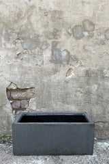 Balcony Pot fiberstone grey small against a grey wall