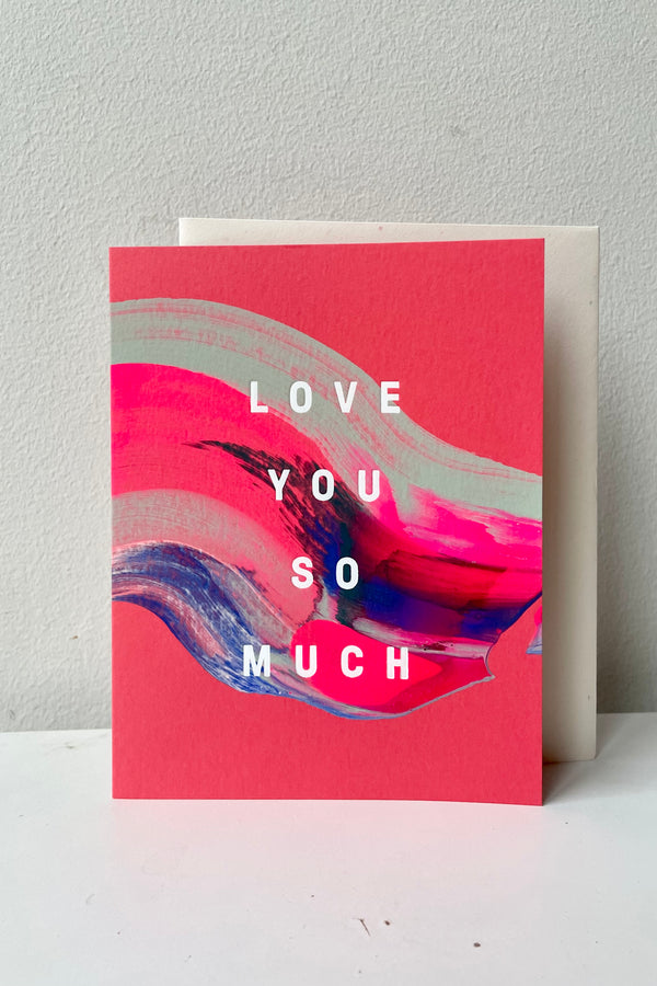Fantasia Love Card handprinted and printed showing its bright colorations against a white wall. 