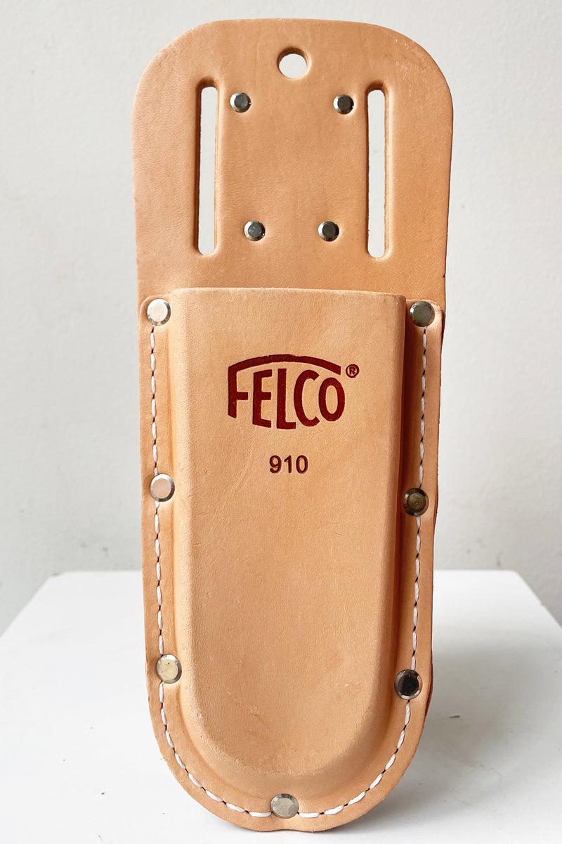 A frontal view of leather Felco Belt Clip Holster against white backdrop