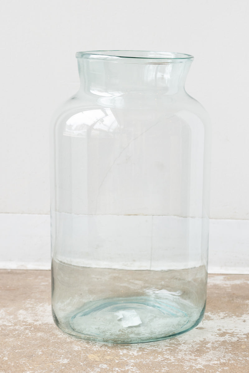 Recycled glass oversized mason jar in front of white background