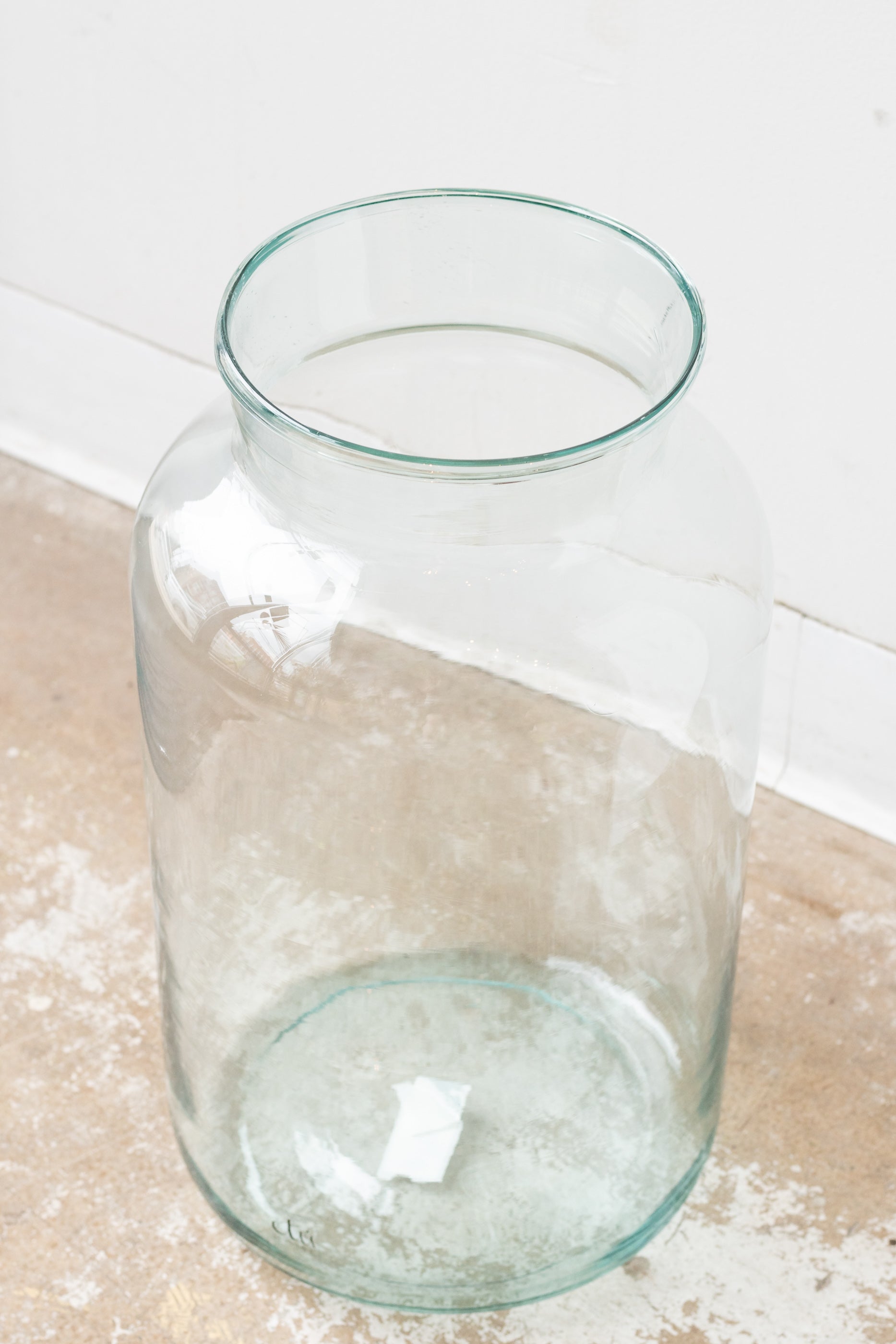 Recycled glass oversized mason jar in front of white background