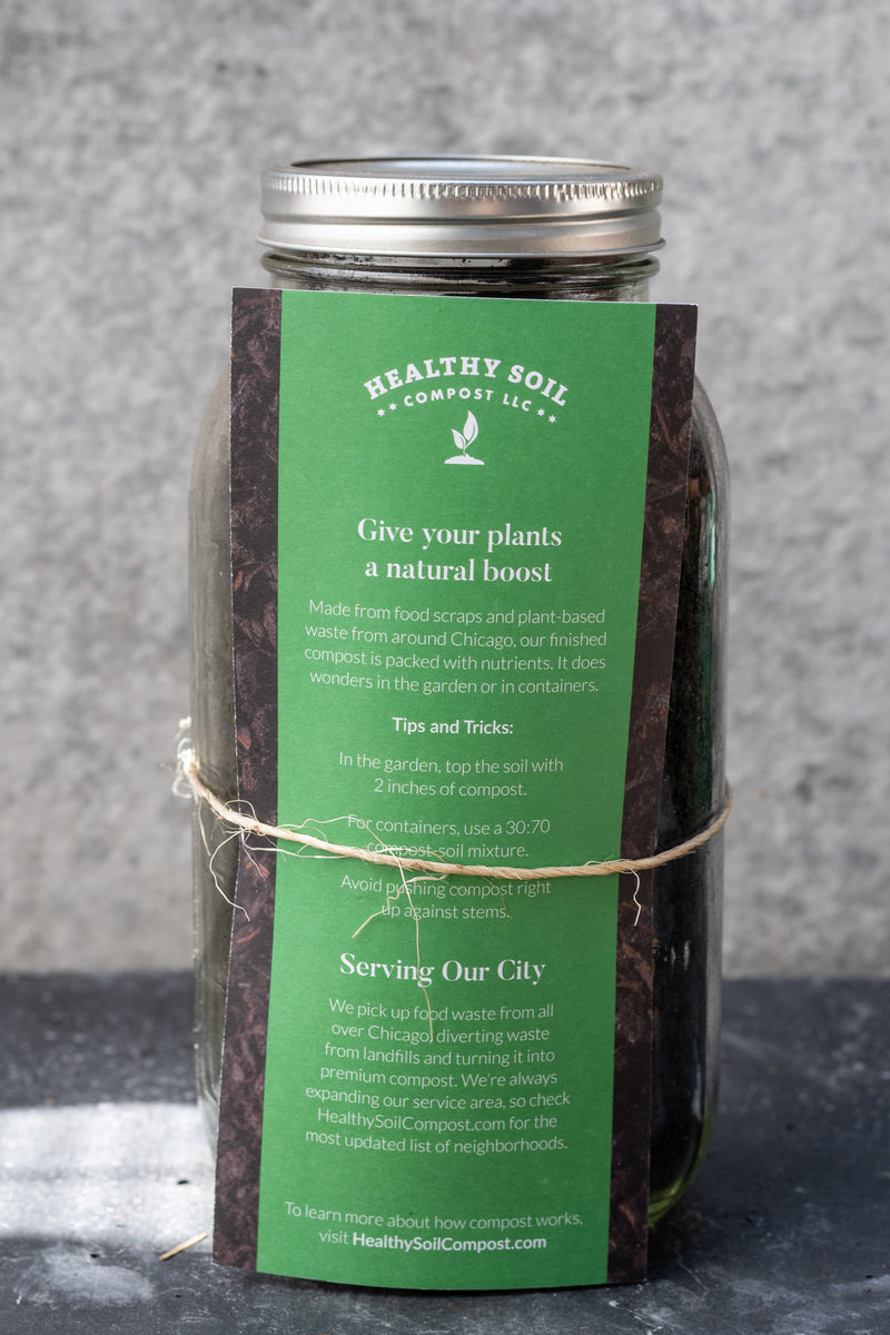 64 ounce mason jar of healthy soil compost with attached information card