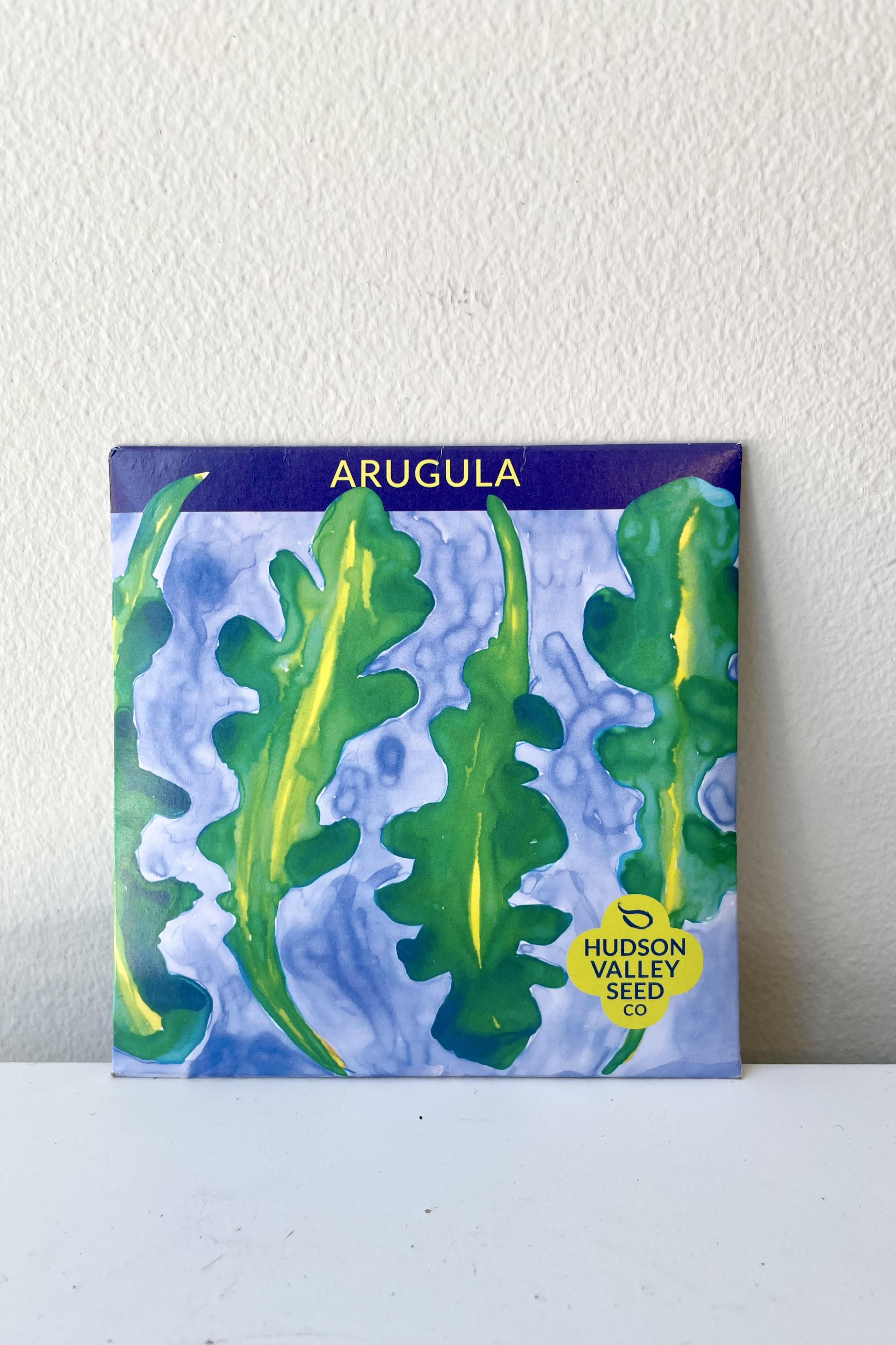 A detailed look at the packaging Green Arugula Seeds Art Pack