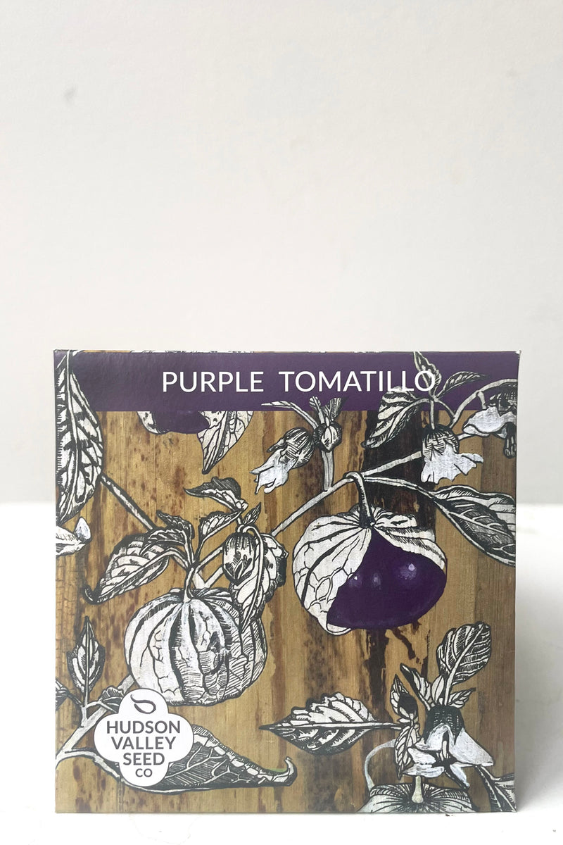 A front view of the Purple Tomatillo Seeds Art Pack against white backdrop