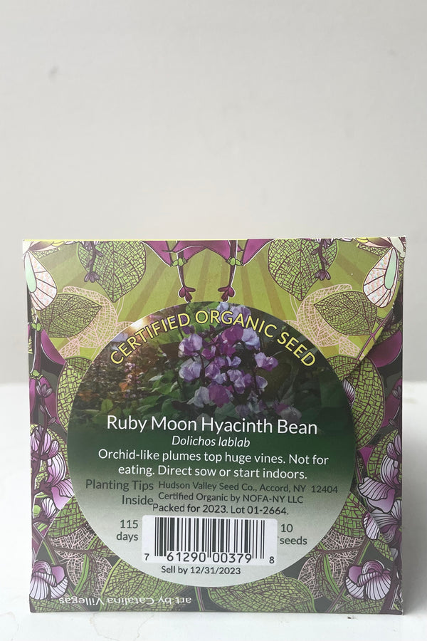A back view of Ruby Moon Hyacinth Bean Seeds Art Pack against white backdrop