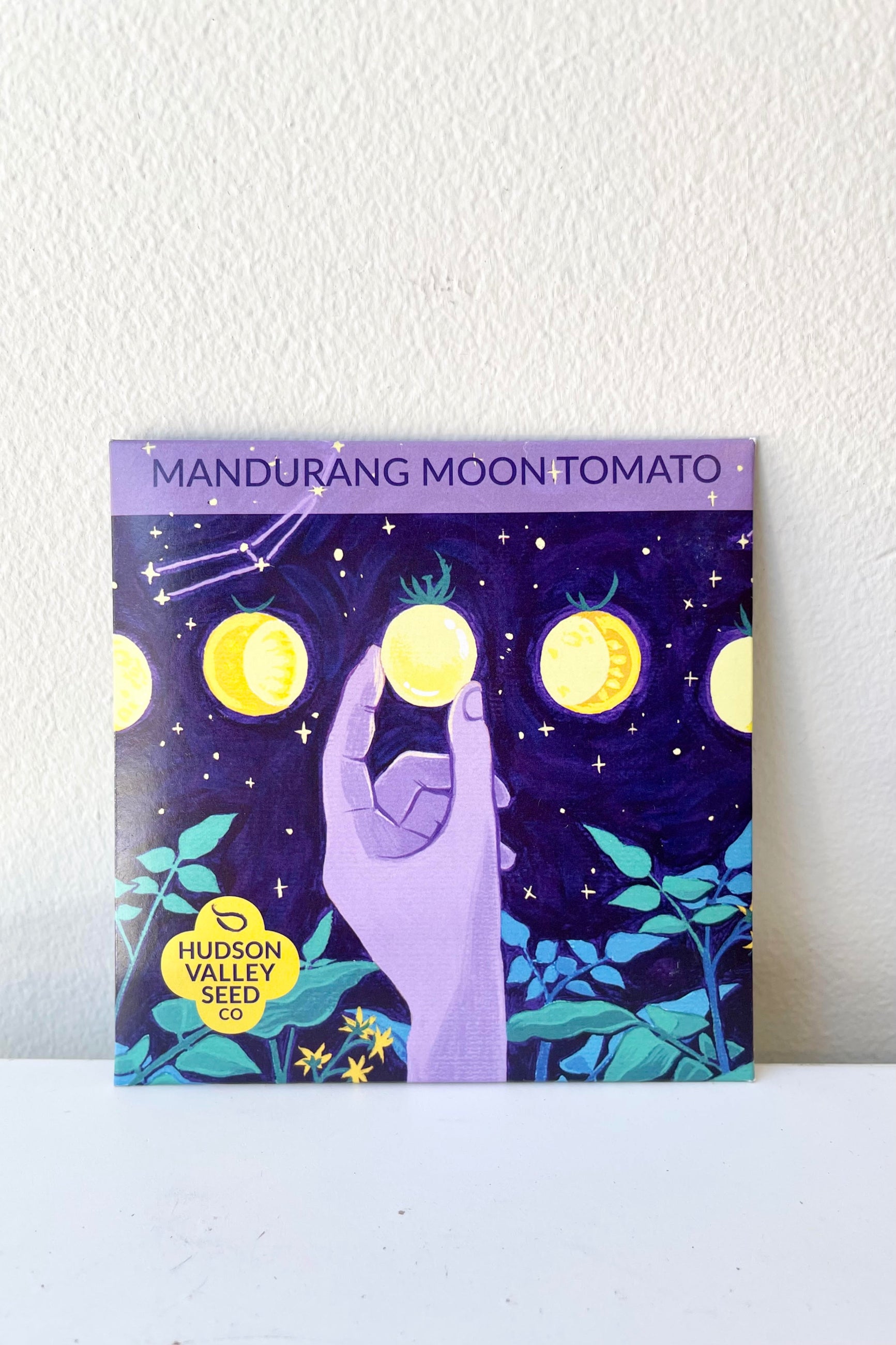 A detailed look at the packaging of the Mandurang Moon Tomato Seeds Art Pack ©Sprout Home