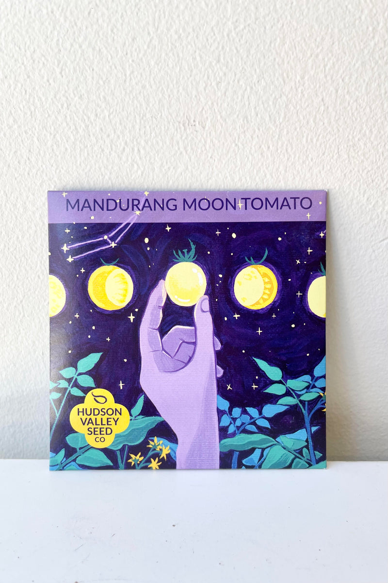 A detailed look at the packaging of the Mandurang Moon Tomato Seeds Art Pack