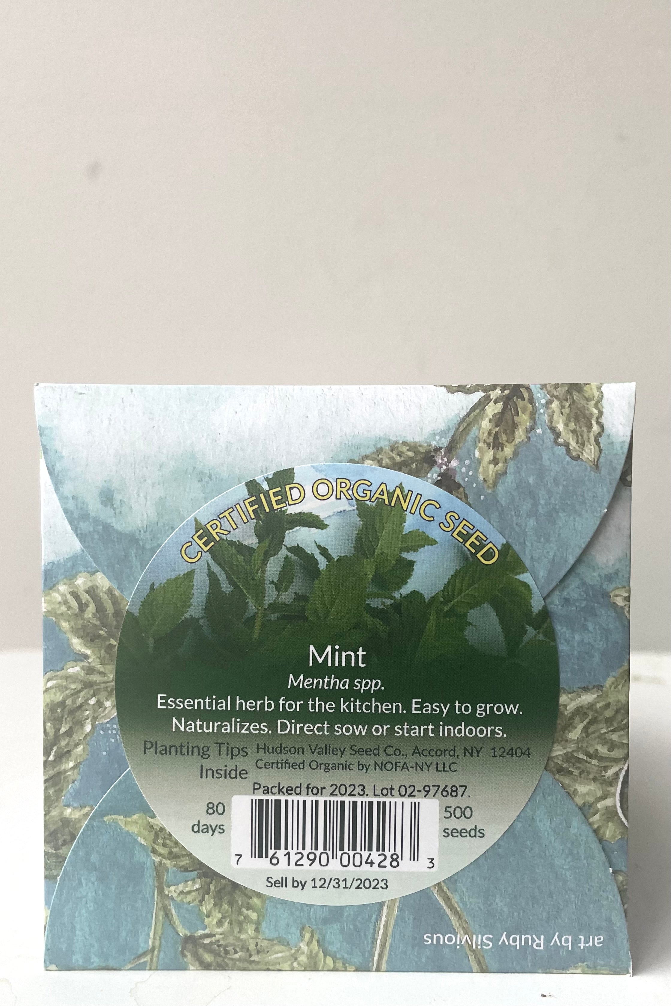 A back view of the Mint Seeds Art Pack against a white backdrop