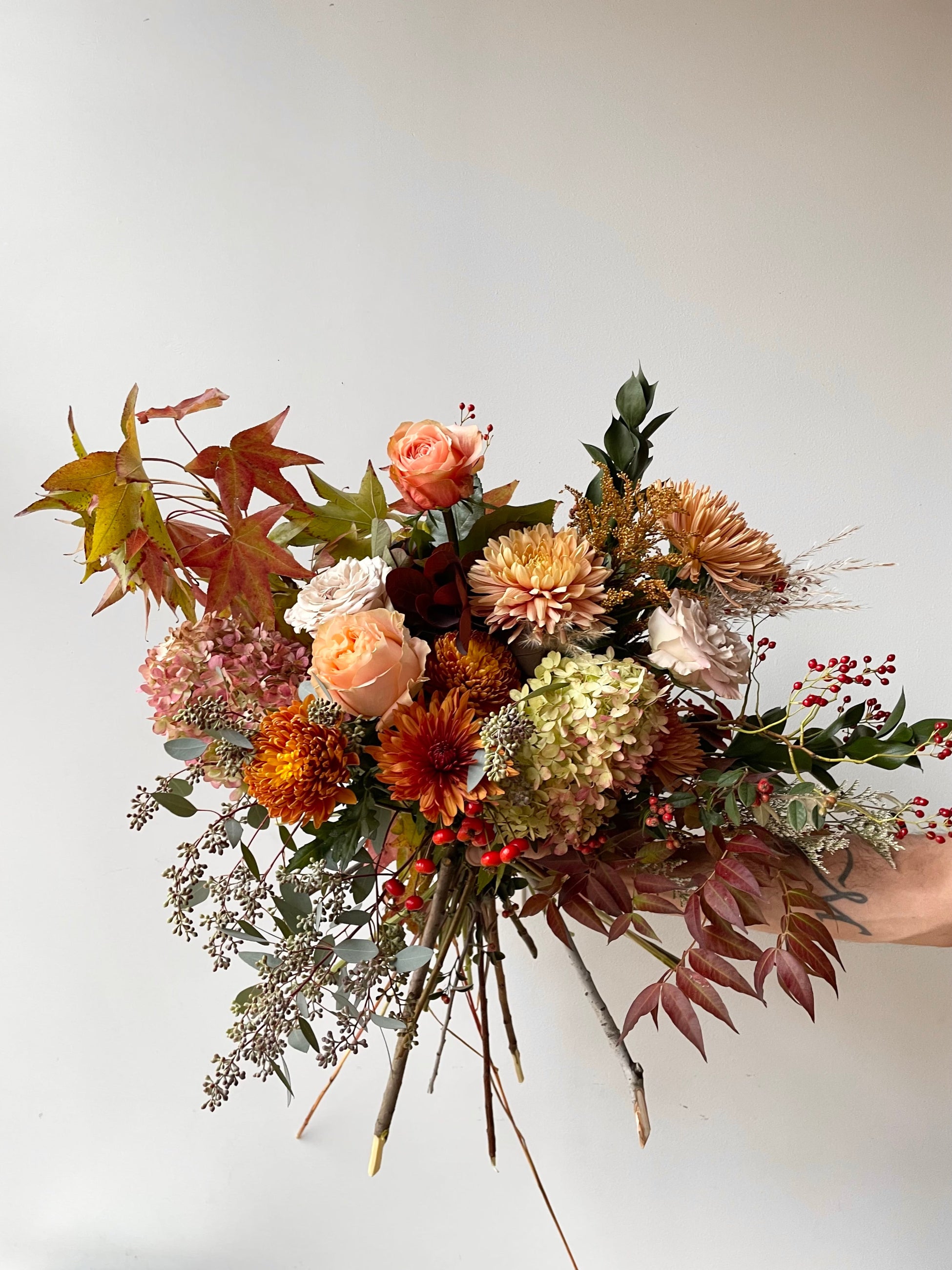 'Harvest Moon' arrangement by Sprout Home available for delivery in chicago or pick up.  Fall colors abound with mums, hydrangea and foliage!!! ©Sprout Home #size_$200