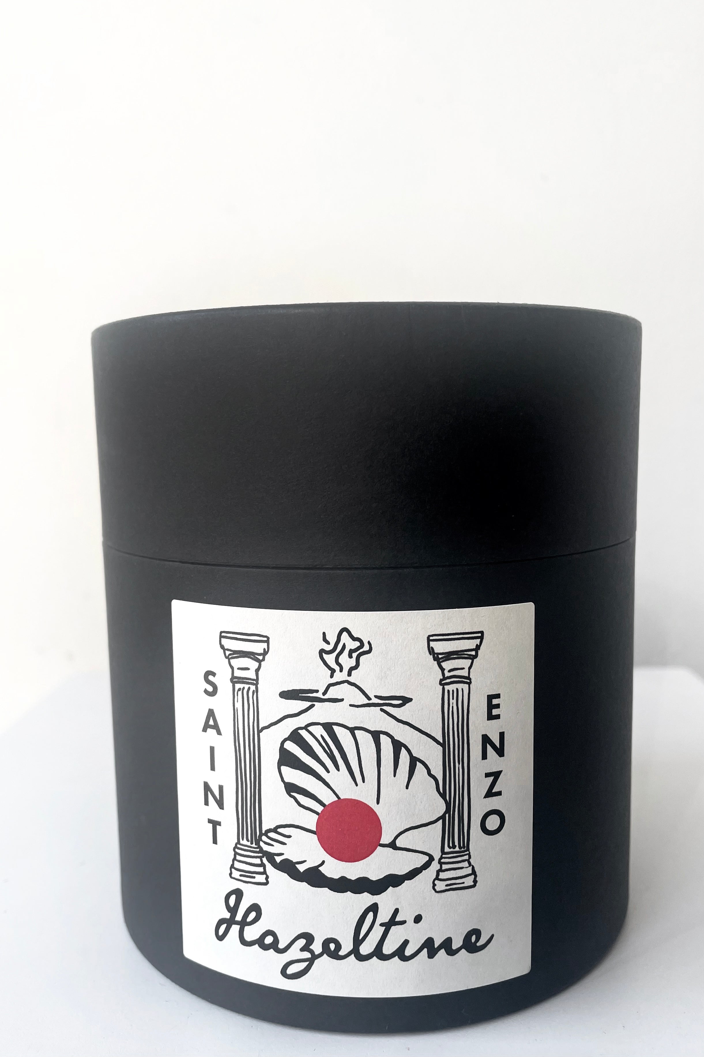 A view of the packaging of Hazeltine Candle saint enzo against white backdrop