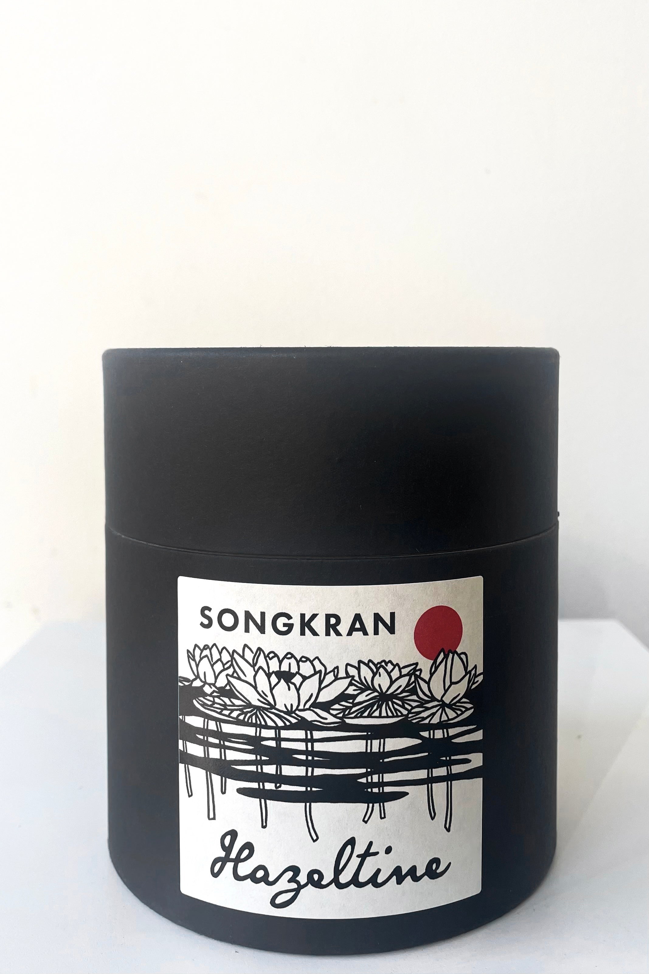 The packaging of Hazeltine Candle songkran against white backdrop