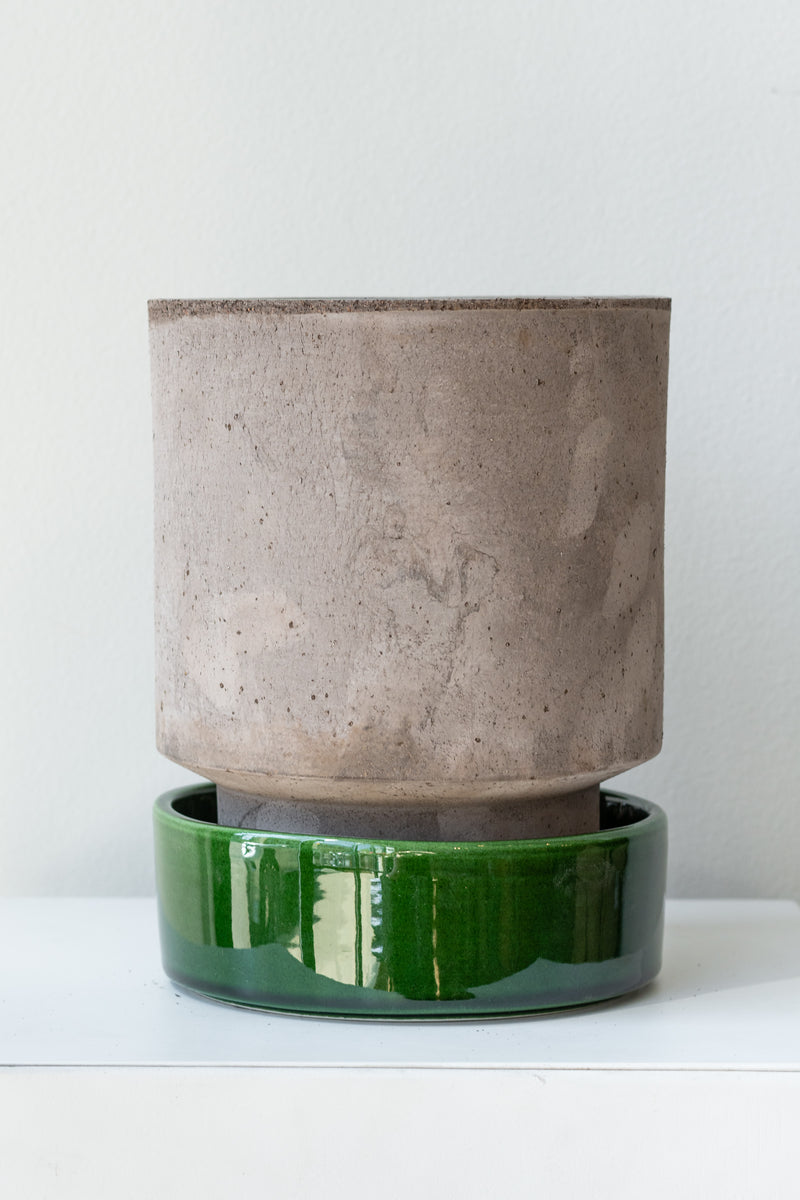 Grey and emerald 5.5 inch Hoff Pot by Bergs Potter on a white surface in a white room
