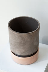 Grey and quartz 5.5 inch Hoff Pot by Bergs Potter on a white surface in a white room