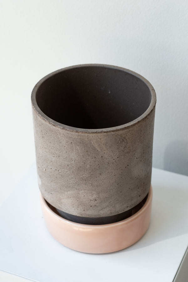 Grey and quartz 5.5 inch Hoff Pot by Bergs Potter on a white surface in a white room