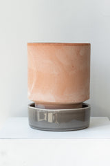 Rosa and pearl 5.5 inch Hoff Pot by Bergs Potter on a white surface in a white room