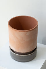 Rosa and pearl 5.5 inch Hoff Pot by Bergs Potter on a white surface in a white room
