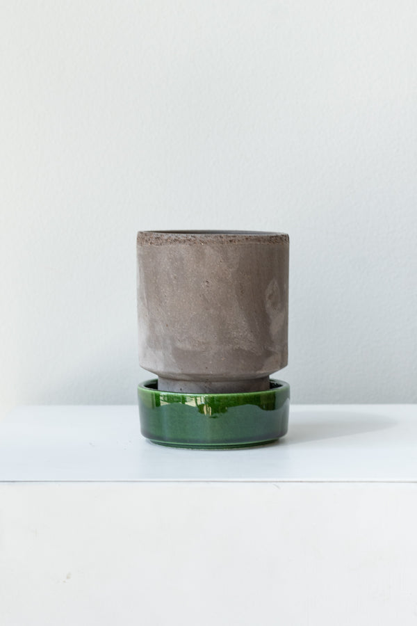 Grey and emerald 3.1 inch Hoff Pot by Bergs Potter on a white surface in a white room