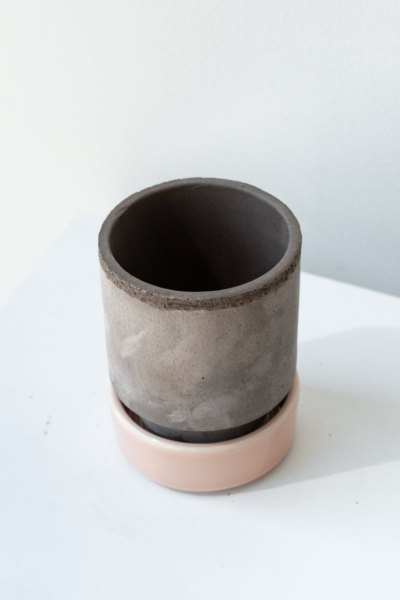Grey and quartz 3.1 inch Hoff Pot by Bergs Potter on a white surface in a white room