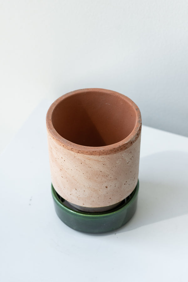 Rosa and emerald 3.1 inch Hoff Pot by Bergs Potter on a white surface in a white room