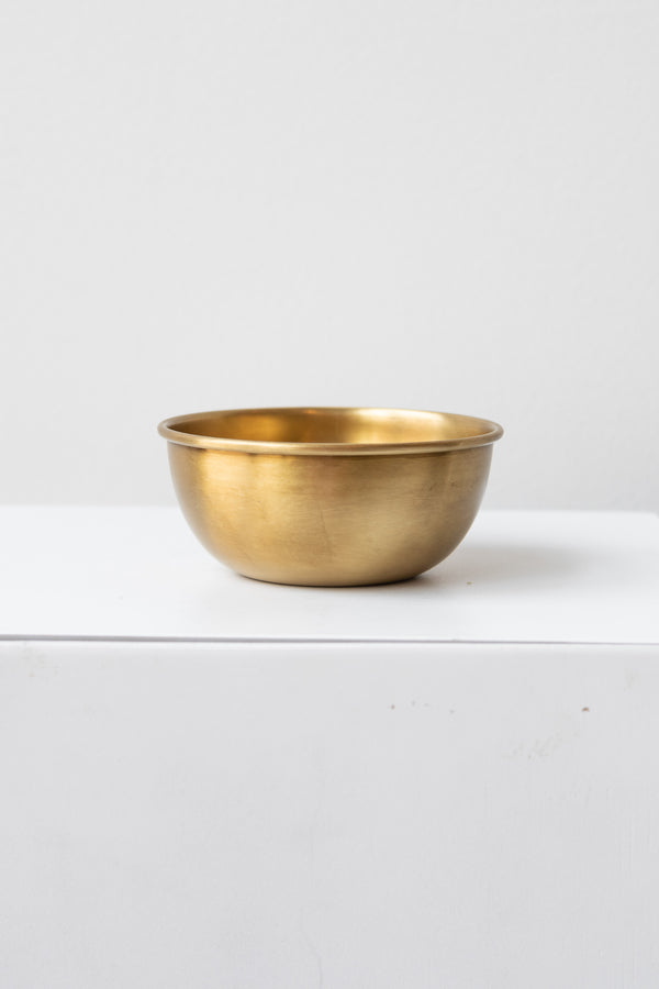 Fog Linen Work medium brass bowl on white surface in a white room