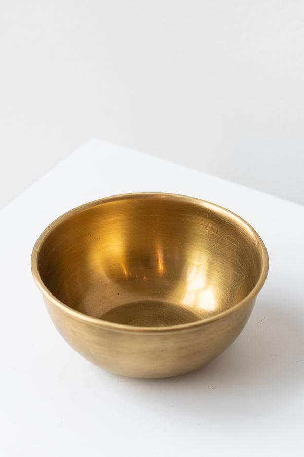 Fog Linen Work medium brass bowl on white surface in a white room