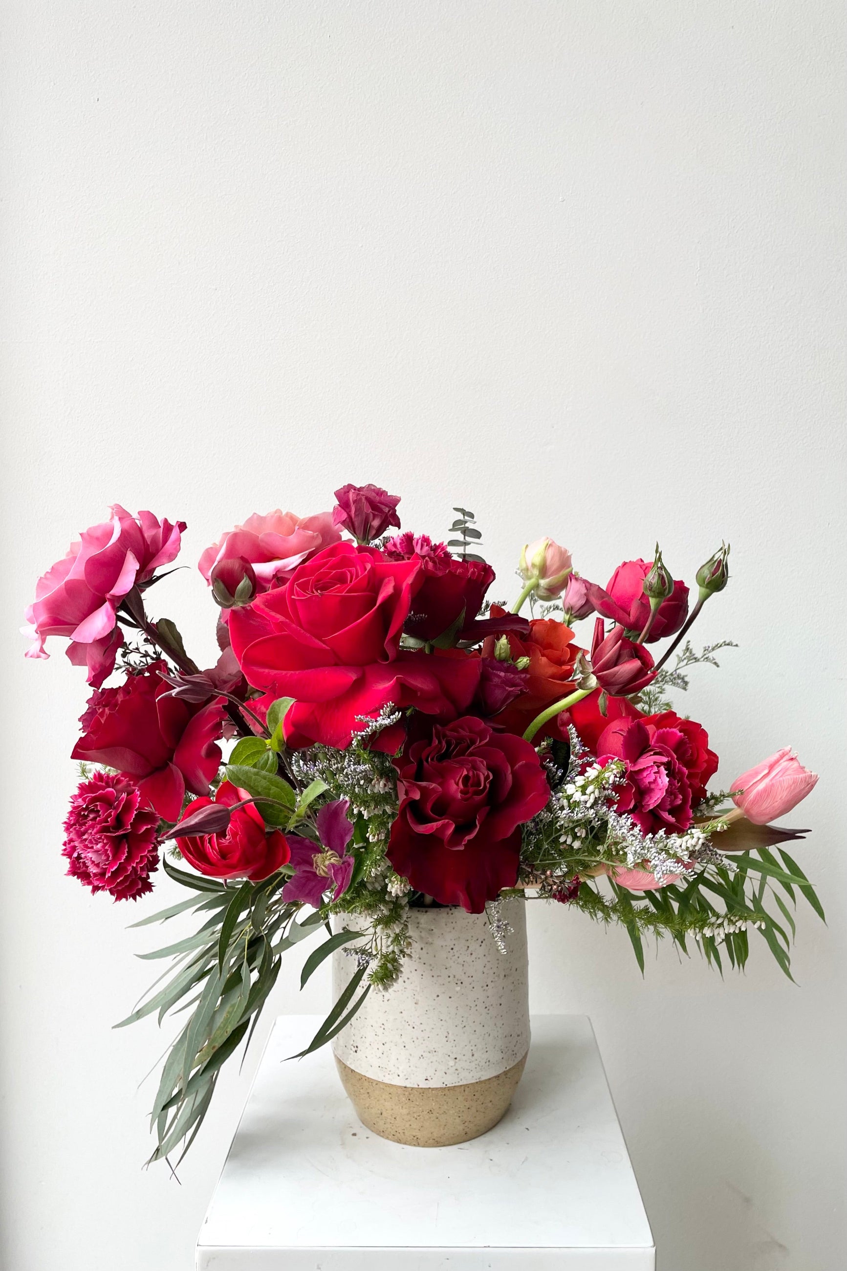 A vase holds an example of fresh Floral Arrangement Modern Love $90 from Sprout Home Floral in Chicago for Valentine's Day ©Sprout Home #size_$100