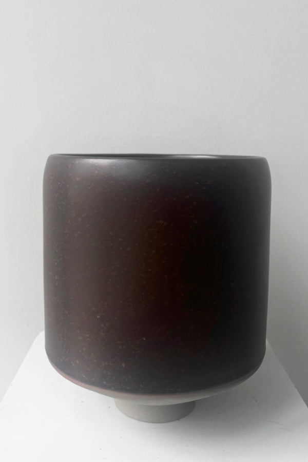A full frontal view of Hagi Cachepot Vase brown against white backdrop