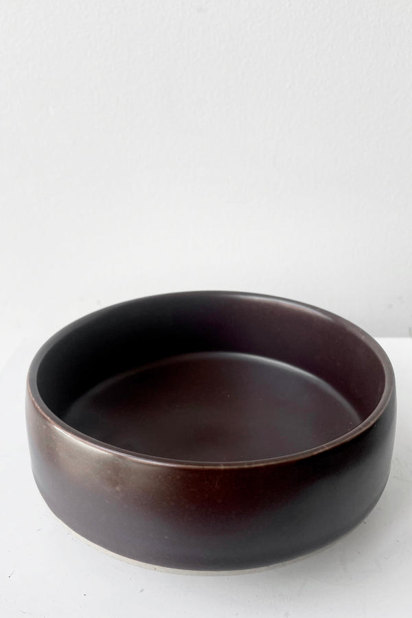 A slightly overhead view of Hagi bowl brown small against white backdrop