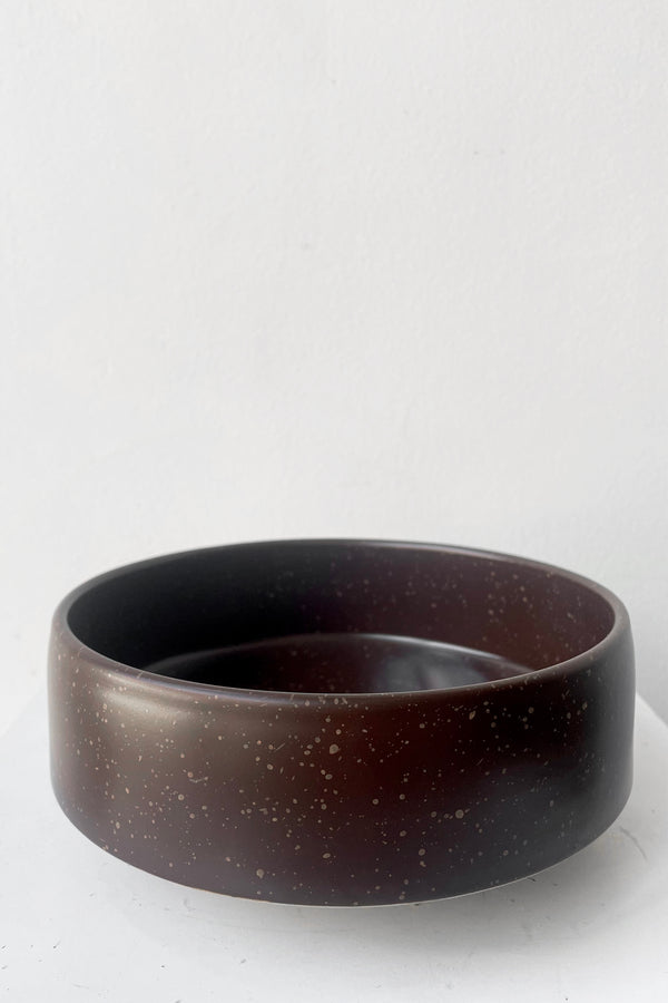 A frontal view of Hagi bowl brown medium against white backdrop