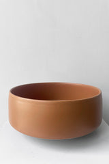 A frontal full view of Hagi bowl caramel large against white backdrop