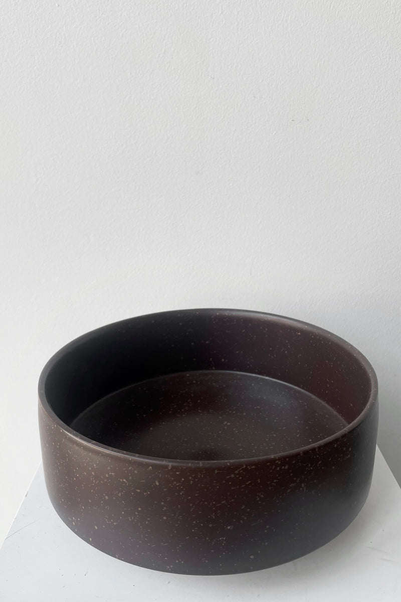 A slightly overhead view of Hagi bowl brown large against white backdrop