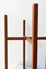 Ascot Plant Stand rust 8" detail  against a white wall